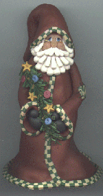 Santa holding little tree